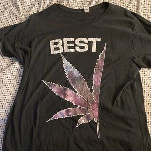 A men or woman’s shirt very comfy only worn twice letters cracked bc barely worn